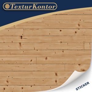 Può includere: Un primo piano di un adesivo effetto legno con una superficie testurizzata. L'adesivo ha un angolo staccabile con la parola "STICKER" stampata su di esso. L'adesivo è della società "TexturKontor".