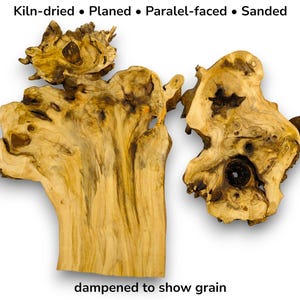 May include: Two pieces of natural wood with a light brown colour and unique grain patterns. The wood has been kiln-dried, planed, parallel-faced, and sanded. The text at the top reads "Kiln-dried • Planed • Parallel-faced • Sanded". The text at the bottom reads "dampened to show grain".
