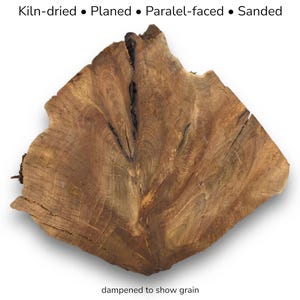 May include: A brown wooden slab with visible grain patterns, featuring a central crack and irregular edges. The text above reads Kiln-dried • Planed • Paralel-faced • Sanded, and the text below reads dampened to show grain.