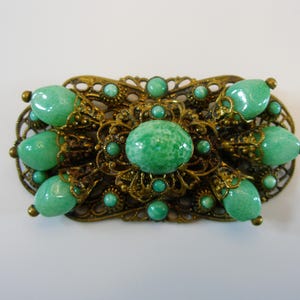 Max Neiger 1930s Green Peking Glass Filigree Design Brooch Set In Filigree Brass Metal