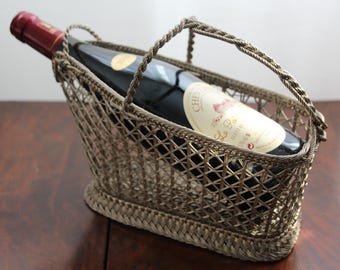 Soporte plateado para botellas de vino. Sirve en la mesa de verano. Decoración para la mesa navideña.