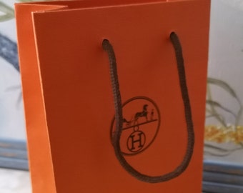 hermes paper bolsa charm