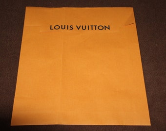 Image result for louis vuitton paper shopping bag yellow