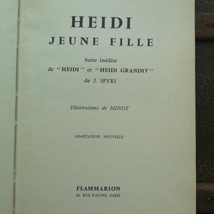 May include: A book cover with the title "HEIDI JEUNE FILLE" in black text on a white background. The subtitle is "Suite in&eacute;dite de "HEIDI" et "HEIDI GRANDIT" de J. SPYRI". The book cover also includes the text "Illustrations de MINOT" and "ADAPTATION NOUVELLE". The publisher is "FLAMMARION 26, RUE RACINE, PARIS".