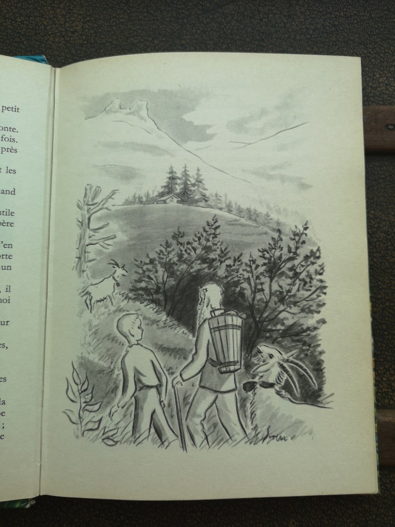 May include: A black and white illustration of a man and a boy walking through a forest with a goat. The man is carrying a basket on his back and the boy is holding a stick. The goat is looking at the camera.