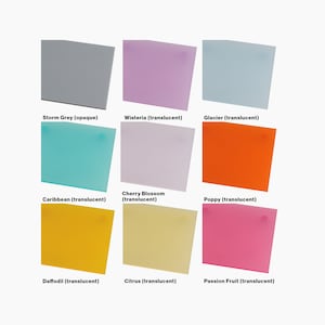 May include: Nine color swatches of translucent and opaque acrylic sheets. The colors are: Storm Grey, Wisteria, Glacier, Caribbean, Cherry Blossom, Poppy, Daffodil, Citrus, and Passion Fruit.