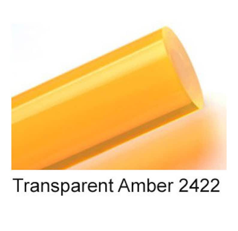 May include: A close-up of a transparent amber rod, showing its smooth, polished surface. The rod is a vibrant yellow color and has a slight sheen.