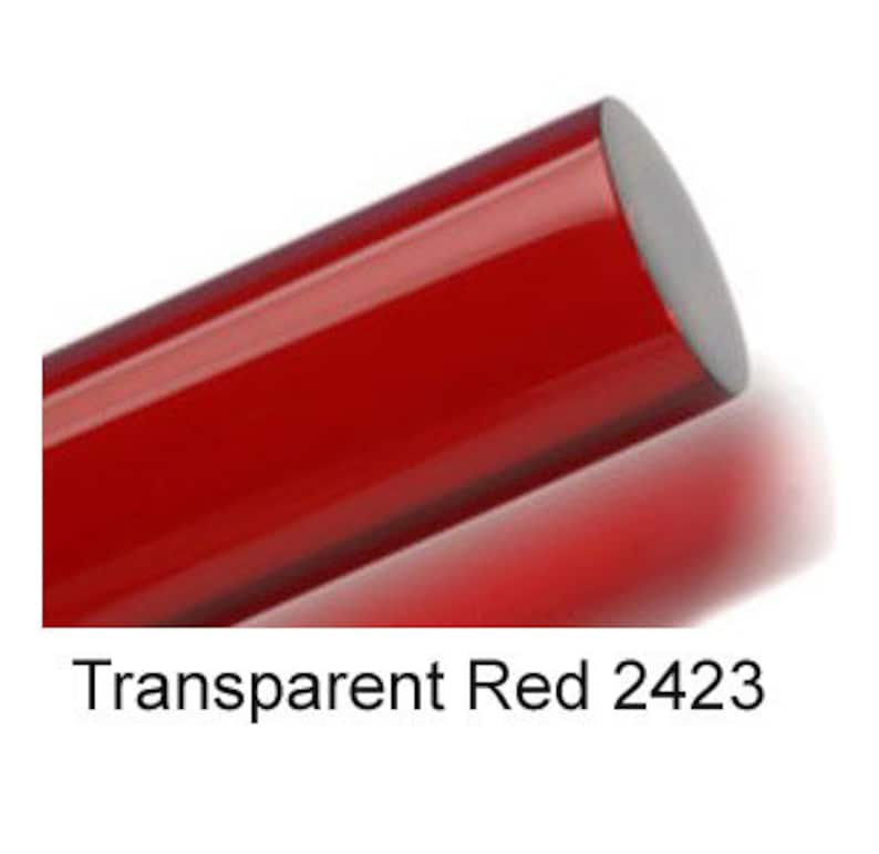 May include: A close-up of a bright red, transparent, cylindrical rod. The rod is smooth and shiny. The text "Transparent Red 2423" is printed below the rod.