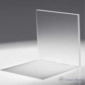 May include: A clear, frosted acrylic sheet. The sheet is smooth and has a subtle texture. It is a versatile material that can be used for a variety of projects.