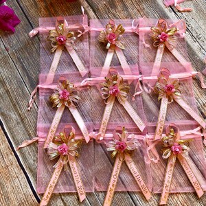 100 decorated organza  bags, baptism favors, with personalized  ribbon.