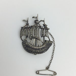 Vintage Germany signed Sterling Silver Art Deco to 1940s marcasite ship brooch. Size 3.6cm x 3cm widest. Stones complete. Nice present gift