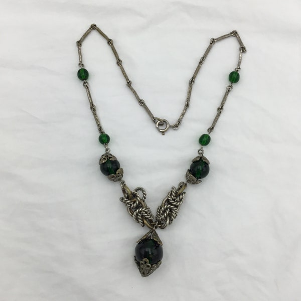 Vintage Art Deco 1920s to 1930s bottle green glass bead and chrome on brass drop short necklace. Some wear metal, glass good & priced low