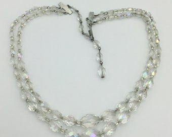 Vintage 2 Row slightly Aurora Borealis Crystal graduating oval bead necklace 1950s to 1960s silver tone adjustable hook chain clasp. Lovely