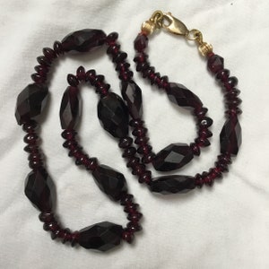 Garnet gemstone bead necklace good quality. 9ct yellow gold substantial clasp. Chunky beads and 45.5cm or almost 18 inches long. Weight 48g.