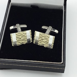 Vintage West Germany gold on Sterling silver rectangular cufflinks. Maker HM. Size 2cm x 14mm. Weight 8.6g. Modernist bark effect & stripes
