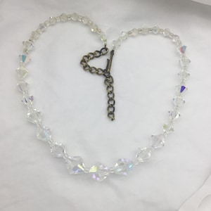 Vintage Aurora Borealis Crystal single row bead necklace 1960s adjustable brass chain hook clasp. Length 38 to 45cm or 15 inch to 17.7 inch