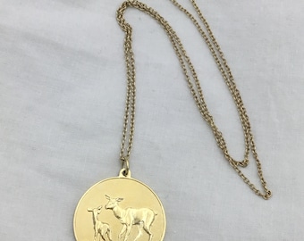 Vintage 24ct gold on Sterling Silver deer, faun and rose ingot circle pendant necklace, 1974. 17.1g