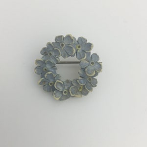 Vintage Art Deco 1920s to 1930s carved 3D pale blue flower wreath celluloid little circle brooch pin C1930s. Quite small size 2.4cm diameter