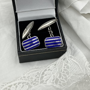Vintage Art Deco Silver blue stripe enamel rectangular cufflinks. Makers mark RB. Weight 5.2g. Fronts good. One back dented.