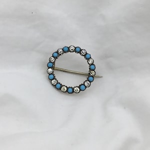 Antique Swedish gold on silver blue turquoise glass & white paste small round brooch. Crown hallmark. Size 2cm