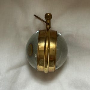 Vintage clear glass domed paperweight desk clock wind up NOT WORKING. C1940s, skeleton visible movement. Heavy 207g