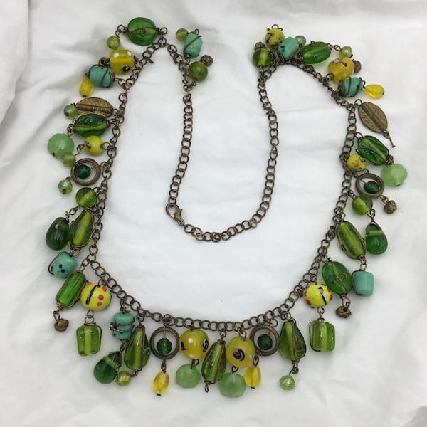 Detailed Green and yellow art glass blue ends of day glass beads brass drop chain necklace second hand not very vintage hence priced low