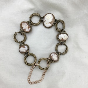 Vintage carved shell cameo lady profile pictures link brass bracelet. 19mm widest length 18.5cm or 7.3 inch 1940s to 1950s. Good condition