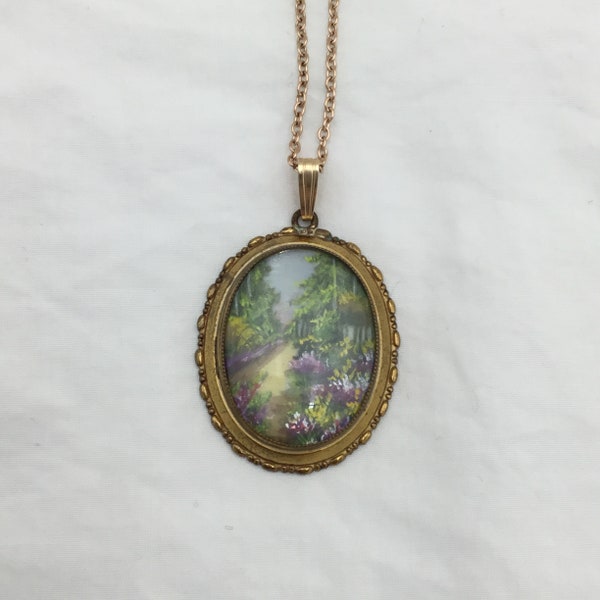Art Deco 1930s 1940s purple yellow green flowers tree landscape gold tone oval pendant. Signed TLM England for Thomas L Mott on later chain