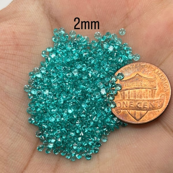 Synthetic Loose YAG Paraiba Gemstones | Small Round | 100pcs/10pcs Parcels | Sizes 2.00MM to 5.00MM | Exquisite Quality and Variety