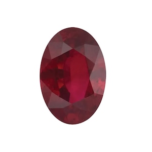 May include: A deep red oval-shaped gemstone with a faceted cut.