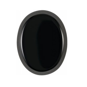 May include: A black, round, smooth, polished, onyx stone cabochon set in a silver bezel.