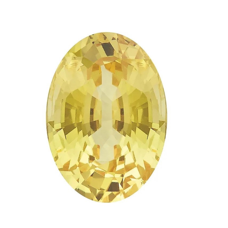 May include: A bright yellow oval-shaped gemstone with a faceted cut.
