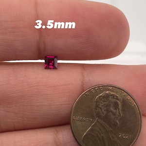May include: A 3.5mm square red gemstone next to a US penny for size comparison.