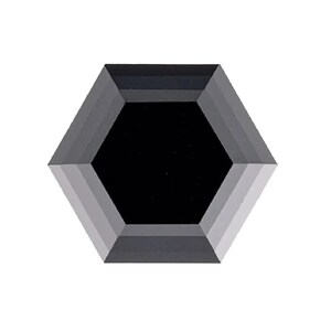May include: A black hexagonal diamond with a faceted cut.