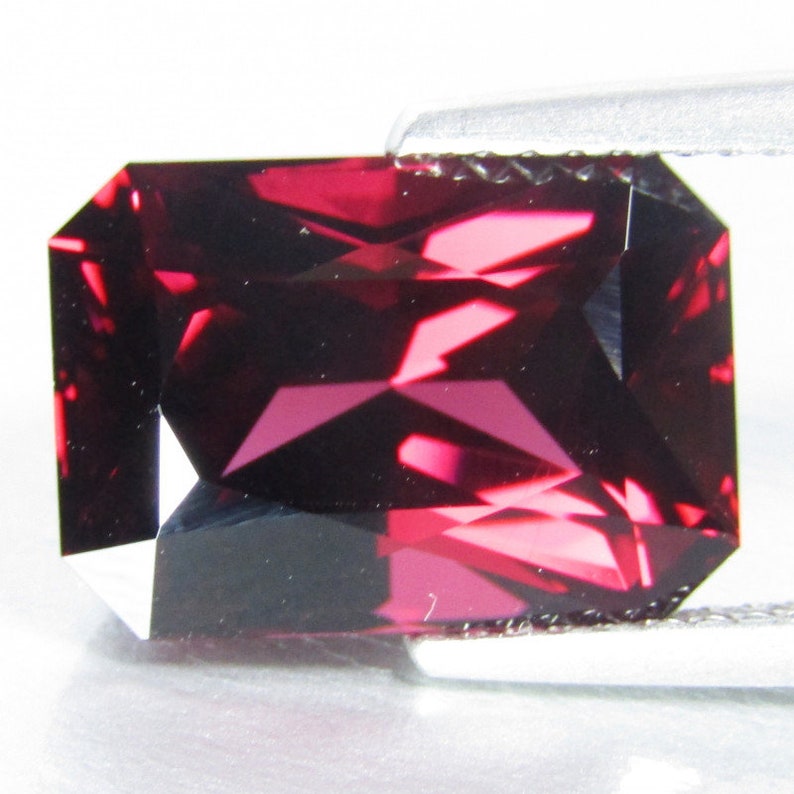 Rhodolite Garnet Emerald Radiant Cut Gemstone.