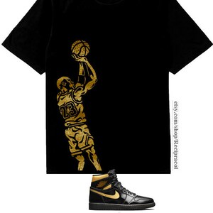Black and best sale gold jordan outfit