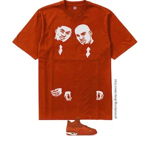 Mörkorange magtröja 4 brick by brick-outfit