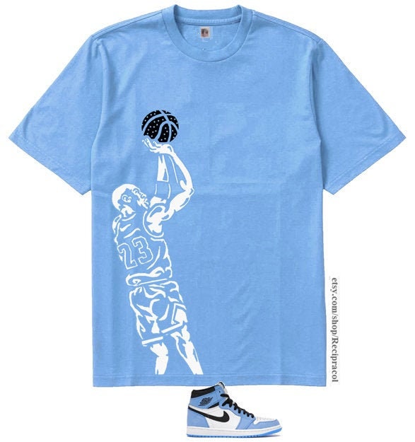 Baby blue and store white jordan shirt