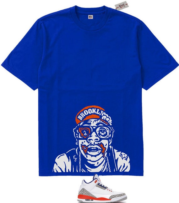 orange and blue jordan shirt