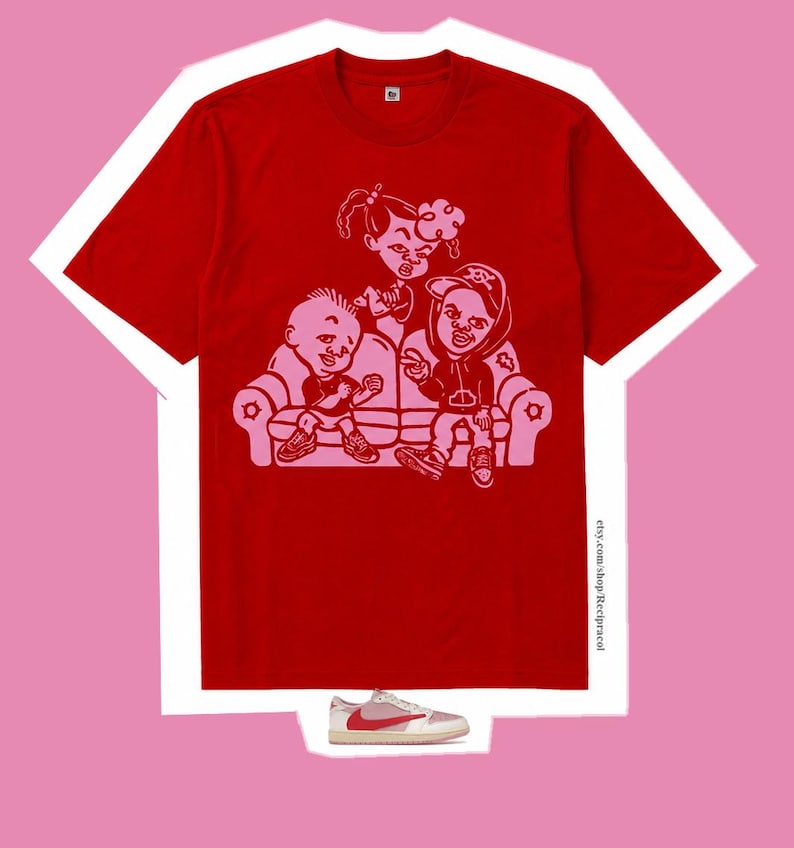 May include: A bright red short-sleeved t-shirt featuring a light pink graphic print of three cartoon characters sitting on a couch. The text etsy.com/shop/Recipracol is printed vertically on the lower right side. A single low-top sneaker is below.