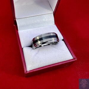 Tungsten Ring With Black Stripe. 8mm in Size 10 (US)