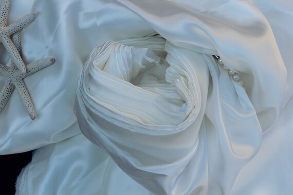 55" width 12mm silk satin, of white color