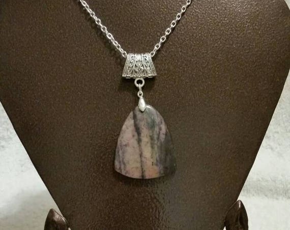 Polished gemstone pendant, purple and black striped stone, silver metal jewelry bail, heavy polished stone necklace, New Jade or Rhodonite