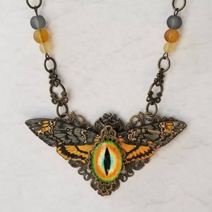 Death&#39;s head moth necklace, Steampunk assemblage, wood lasercut Hawk moth, bronze tone, orange dragon eye, cultured sea glass, Victorian
