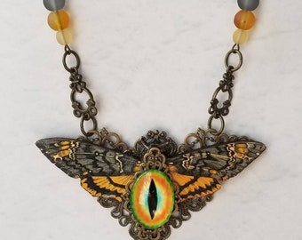 Death's head moth necklace, Steampunk assemblage, wood lasercut Hawk moth, bronze tone, orange dragon eye, cultured sea glass, Victorian