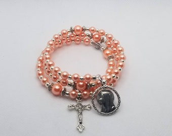 Bracelet, Five decade, memory wire rosary bracelet, silver tone, peach glass pearls, budded crucifix, Mary Madonna religious medal, Catholic