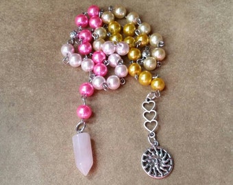 Imbolc prayer beads, pagan prayer beads, witches prayer beads, stainless steel, glass pearls, Pink Quartz pendulum, sun charm, unique gift