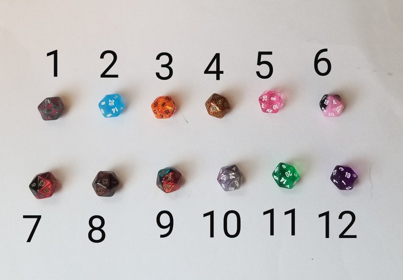 May include: Twelve 20-sided dice in various colors and patterns, numbered 1 through 12.