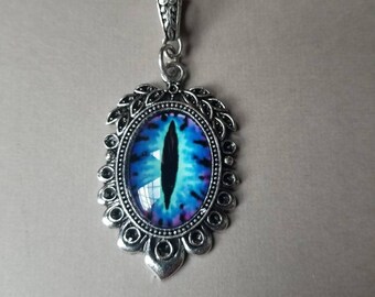 Dragon eye pendant, dragon eye necklace, silver-toned frames, cat eye jewelry, demon eye pendant, glass eye cabochons, aqua or blue eyes