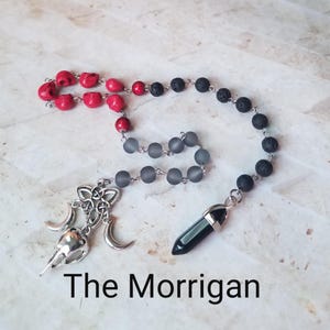 The Morrigan prayer beads, Goddess prayer beads, hand-wired, Lava stone, red skulls, cultured sea glass, Raven and moon charms, Goddess